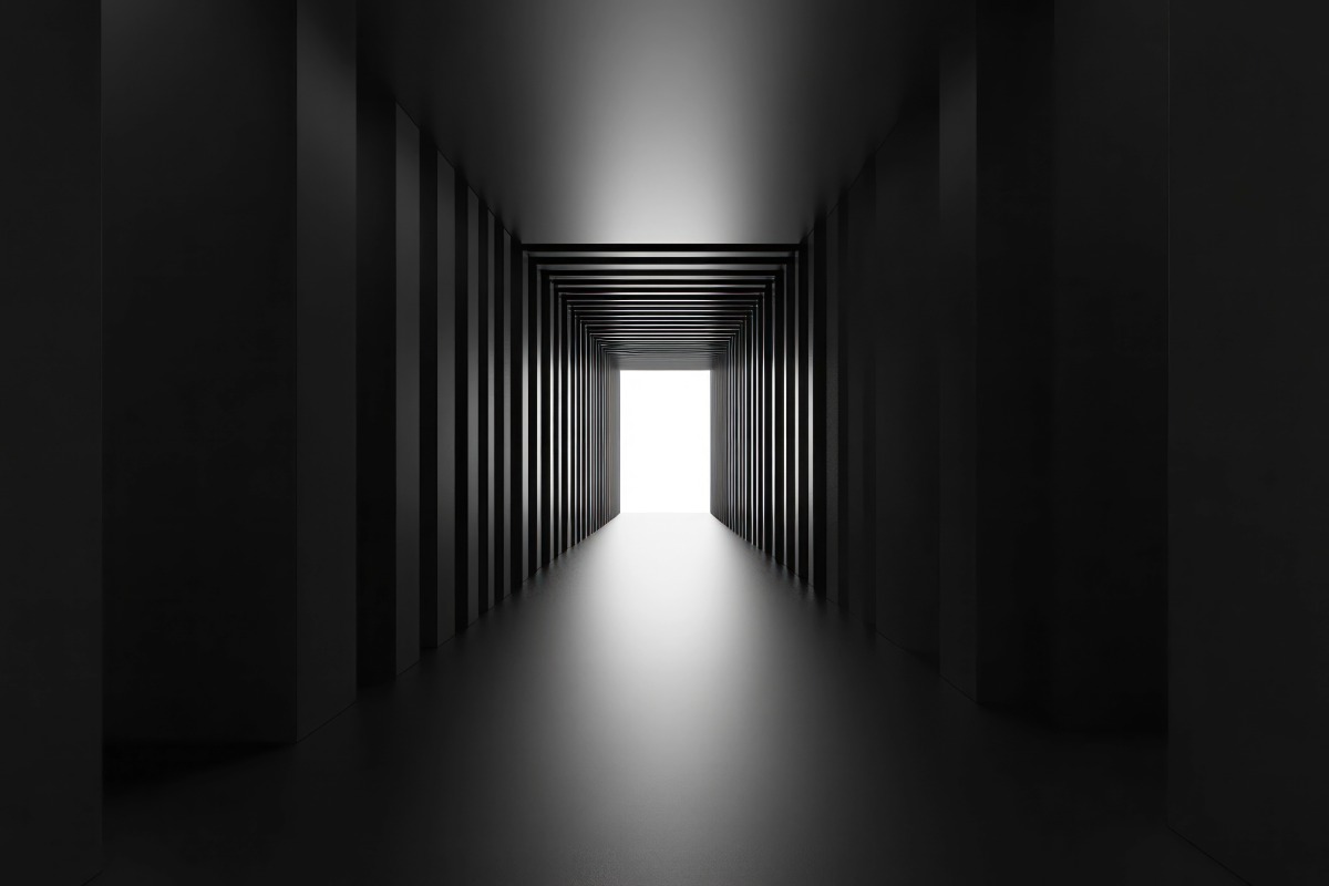 Minimalist corridor leading to bright light, representing trust, institutional credibility, governance, and leadership guiding clients toward clarity in digital and traditional finance.